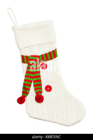 Pullover Weihnachtsstrumpf mit Schal und Tasten isoliert auf einem weißen Hintergrund. Stockfoto