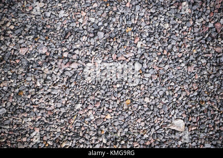Grau körnig sandigen Boden. Hintergrund, Textur. Stockfoto