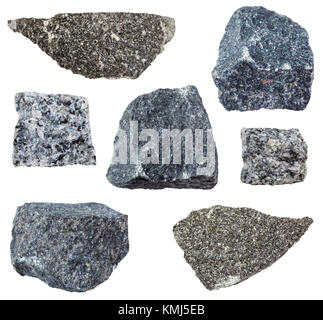 Sammlung von natürliche mineralische Proben - verschiedene Formen der Gabbro rock (gabbro, dolerit, Diabas, microgabbro) auf weißem Hintergrund Stockfoto