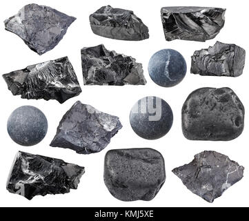 Sammlung von natürliche mineralische Proben - verschiedene Shungite Steine auf weißem Hintergrund Stockfoto