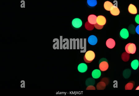 Abstrakte unscharfe, Bokeh, Unscharf Geschossen von Multi-color Leds auf schwarzen Hintergrund, mit Freiraum für Text und Gestaltung Stockfoto
