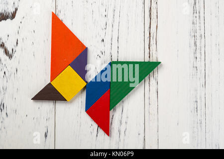 Holz tangram Bei einem Schmetterling Form Stockfoto