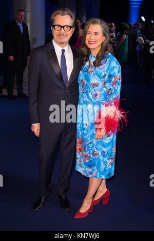Gary Oldman und Gisele Schmidt kommen für den British Independent Film Awards am Old Billingsgate in London. Stockfoto
