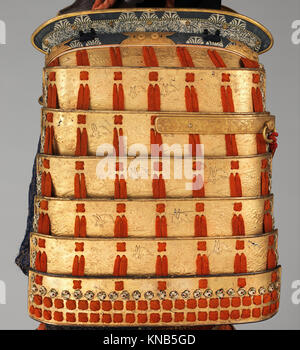 Ein MET Kollektion Gusoku Rüstungsset repräsentiert traditionelle japanische Samurai Rüstungen mit detaillierter Handwerkskunst, Metallarbeiten und schützendem Design. Für Untersuchung und Anzeige beibehalten. Stockfoto