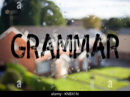 Ansage Bildunterschrift übersicht Grammatik. Business Konzept für die grundlegenden Regeln der Syntax grammatische Sprache auf alten Ziegel Hintergrund mit s geschrieben Stockfoto