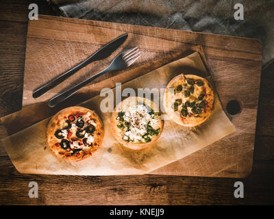 Auswahl der Pizzettes Stockfoto