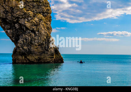 Jumper am Durdle Door in England Stockfoto