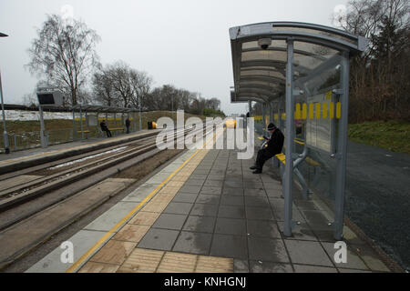 Die Leigh geführte Schienenverteiler, betreibt die Busse V1 und V2 in Manchester City Centre aus dem NewearthRoad Bus Plattform, Worsley Manchester, Großbritannien Stockfoto