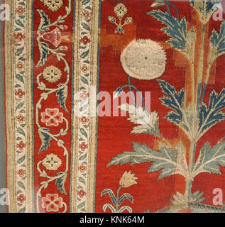 Ein türkischer Teppich aus Wolle aus dem 18. Jahrhundert mit symmetrisch geknüpftem Stapel, der die traditionellen Webtechniken und Muster dieser Zeit hervorhebt. Stockfoto