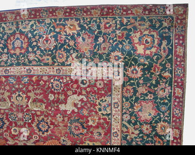 Ein Teppich aus der Sammlung des Metropolitan Museums, Katalognummer wb-17.120.127d 446954. Dieses Textil zeigt dekorative Muster und handwerkliches Können, das als Beispiel historischer Webkunst erhalten wurde. Stockfoto