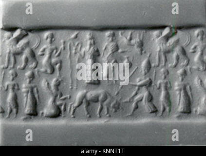 Ein Zylindersiegel und ein moderner Eindruck aus der MET-Sammlung, katalogisiert als ss1985 192 8 327077, der einen Mann darstellt, der einen Stier, einen greifdämon und darüber liegende Gottheiten besaß, erhalten als altes künstlerisches und rituelles Artefakt. Stockfoto