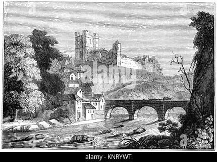 Eine Ansicht der Richmond Brücke mit Wagen und packpferden Überquerung des Flusses Swale unter dem Markt Stadt Richmond, Richmond Castle, 1086 abgeschlossen übersehen. North Yorkshire, England. Stockfoto