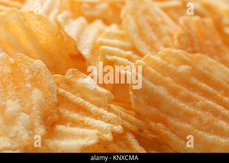 Chips essen Hintergrund Stockfoto