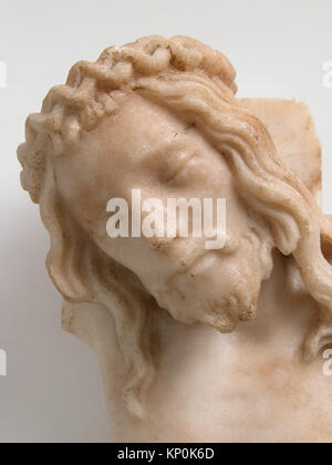 Ein geschnitzter Holzkorpus, der Christus in einer Kreuzigungsgruppe darstellt, aufbewahrt im Metropolitan Museum of Art, zeigt religiöse Ikonographie und plastische Handwerkskunst aus der Zeit. Stockfoto
