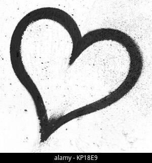 Konzept oder konzeptuelle schwarz lackiert abstrakte Herzform Liebe Symbol, schmutzige Wand Hintergrund, Metapher für die städtischen und romantischen Valentine, Grunge Stil. Stockfoto