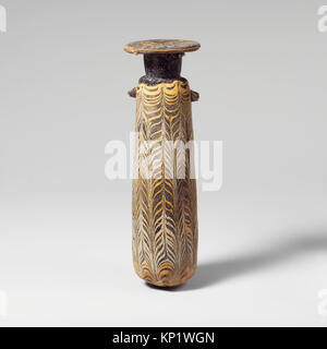 Ein Glas Alabastron aus der MET-Kollektion, katalogisiert als DP151248 250016, verwendet in der Antike zur Aufbewahrung von Parfüm und Duftölen. Stockfoto