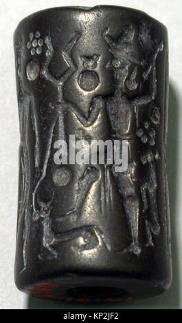 Dieses Zylindersiegel und sein moderner Eindruck zeigen einen Gott, der eine Keule hält, und eine anflehende Göttin, die die antike mesopotamische religiöse Ikonographie repräsentiert. Stockfoto