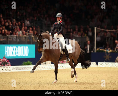 Großbritanniens Lara Butler reiten Rubin Al Asad konkurriert in der FEI World Cup Dressur Grand Prix Kür bei Tag zwei der London International Horse Show in London Olympia. Stockfoto