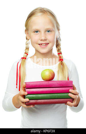 Mädchen mit Apfel und Bücher Stockfoto