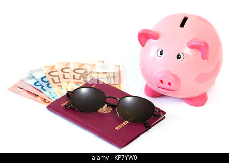 Reisepass mit Geld und piggy Bank Stockfoto