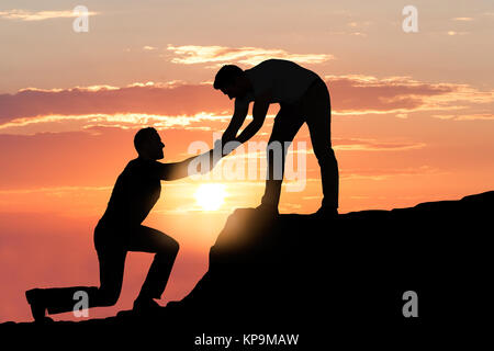 Sonnenuntergang am Strand Stockfoto