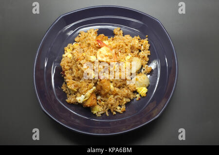 Gebratenen Reis mit Chilipaste rühren Stockfoto