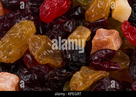leckere süße mischen getrocknete Früchte farbigen Hintergrund Stockfoto