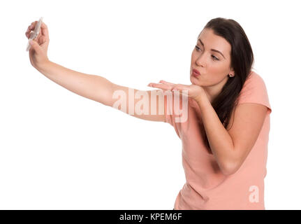 Junge Frau mit einem Schmollen und macht einen selfie Stockfoto