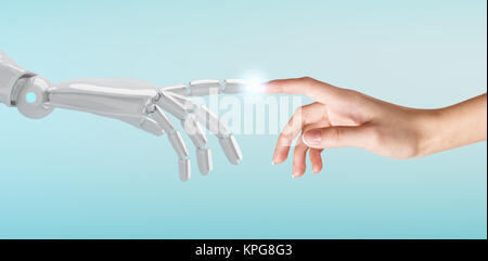 Menschliche Hand berühren ein Android Hand. Stockfoto