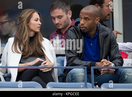 FLUSHING NY-SEPTEMBER 08: Andrea Rajacic, Thierry Henry, an der Mens Singles Finale Tag 15 der 2014 US Open am USTA Billie Jean King National Tennis Center am 8. September 2014 in der Nähe der Queens Borough von New York City People: Andrea Rajacic, Thierry Henry Stockfoto