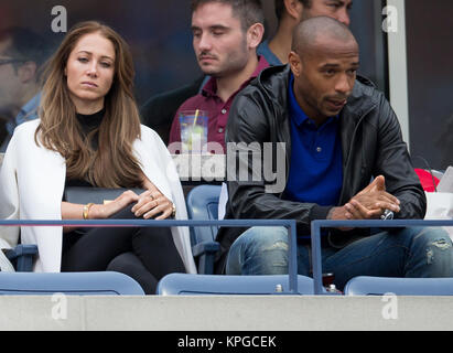 FLUSHING NY-SEPTEMBER 08: Andrea Rajacic, Thierry Henry, an der Mens Singles Finale Tag 15 der 2014 US Open am USTA Billie Jean King National Tennis Center am 8. September 2014 in der Nähe der Queens Borough von New York City People: Andrea Rajacic, Thierry Henry Stockfoto