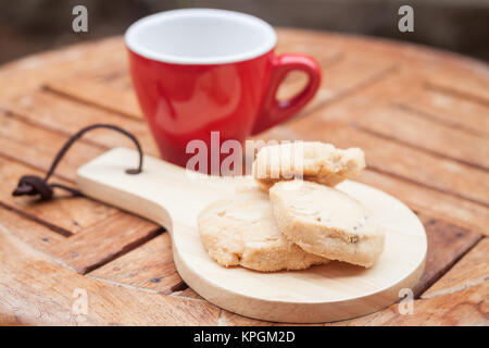 Cashew Kekse mit Kaffeetasse Stockfoto