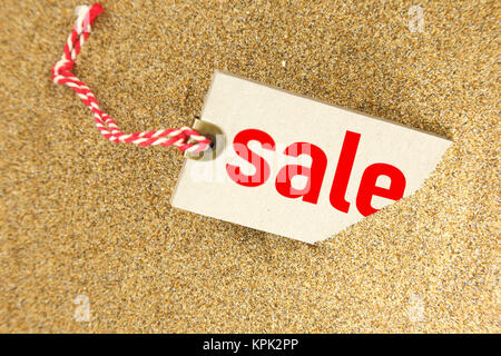 Big Verkauf Tag auf Sand closeup Stockfoto