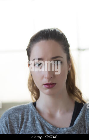 Traurige junge Frau Stockfoto