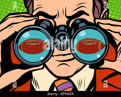 Der Mann ist American Football beobachten. Stockfoto