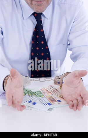 Model Release, Geschaeftsmann in Handschellen, Symbolbild Wirtschaftskriminalitaet - Business-Mann in Handschellen Stockfoto