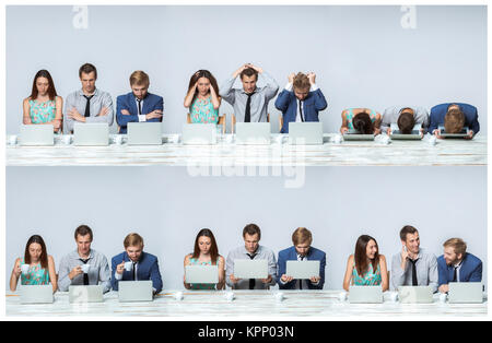 Das Business Team arbeiten auf Laptops im Büro Stockfoto