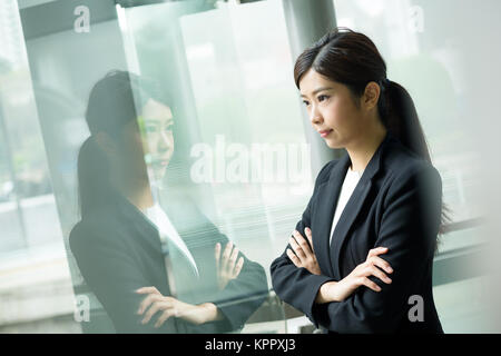 Geschäftsfrau im Büro Stockfoto