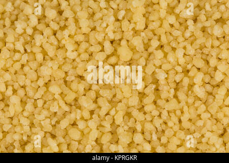 Couscous als Hintergrund Textur Stockfoto