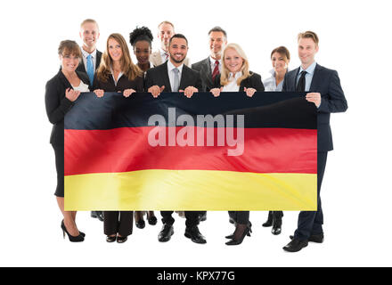 Zuversichtlich, multi-ethnische Business Team Holding leere Plakatwand Stockfoto