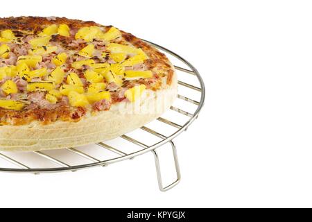 Pizza auf der Runde Rack Stockfoto