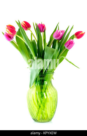 Blumenstrauß aus Tulpen in glass vase Stockfoto