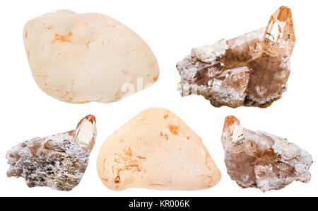 Topaz Kristallen auf Rock und geschliffene Edelsteine Stockfoto