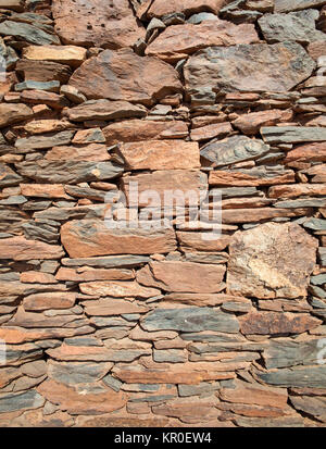 Äußere Trockenmauern Wand eines Hauses aus flacher roter Rock, Lokal "laja, Gran Canaria Stockfoto