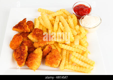 Pommes Frites und Nuggets Stockfoto