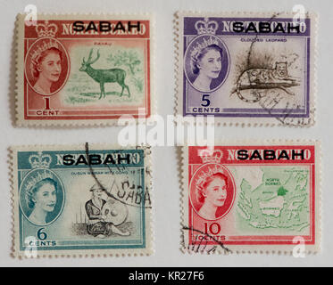 Britische Briefmarken aus der ehemaligen Kolonie North Borneo mit Aufdruck Sabah Stockfoto