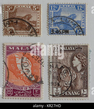 Briefmarken aus der ehemaligen britischen Kolonie Malaya Stockfoto
