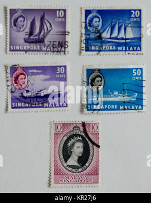 Briefmarken aus der ehemaligen britischen Kolonie Singapur und Malaysia Stockfoto