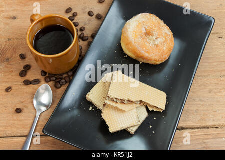 Kaffee und Wafer Stick und Donuts Zucker Stockfoto