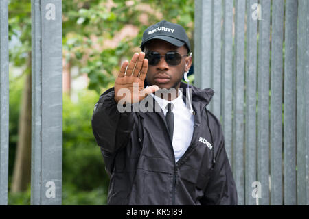 Security Guard, Stop Geste Stockfoto